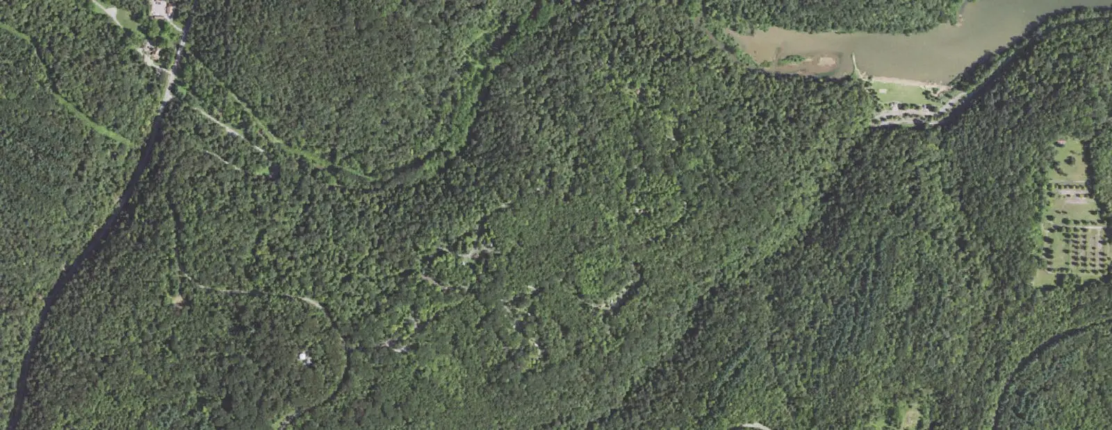 Satellite view of Raccoon Creek State Park Campground, with its 171 sites marked