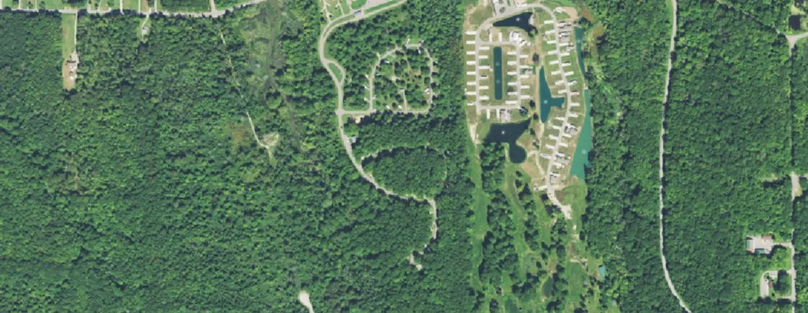 Satellite view of Geneva State Park Campground, with its 94 sites marked